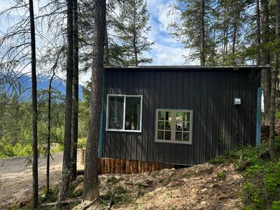 Exterior side view through trees
